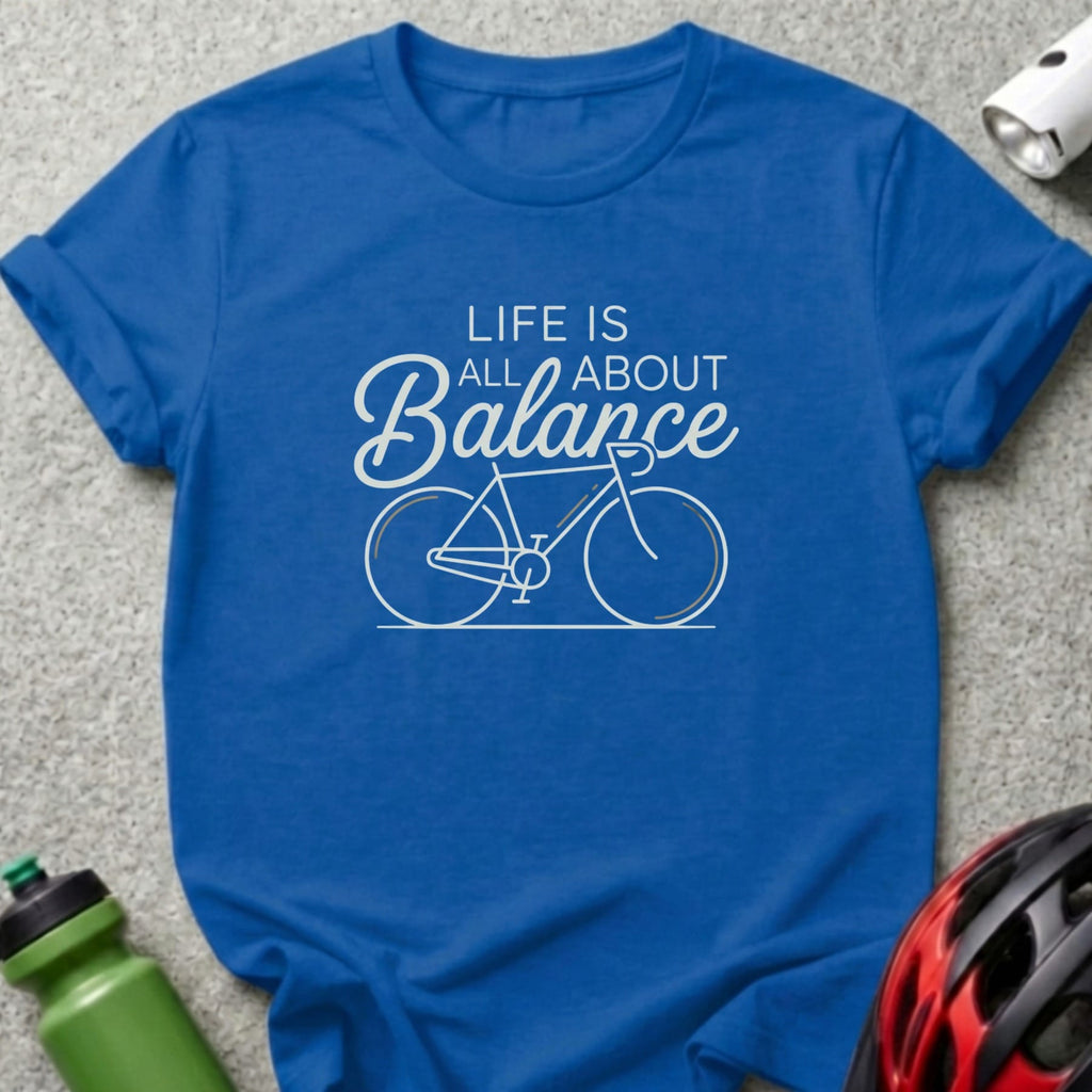 Blue t-shirt with a white line drawing of a bicycle and "Life is all about balance" text.