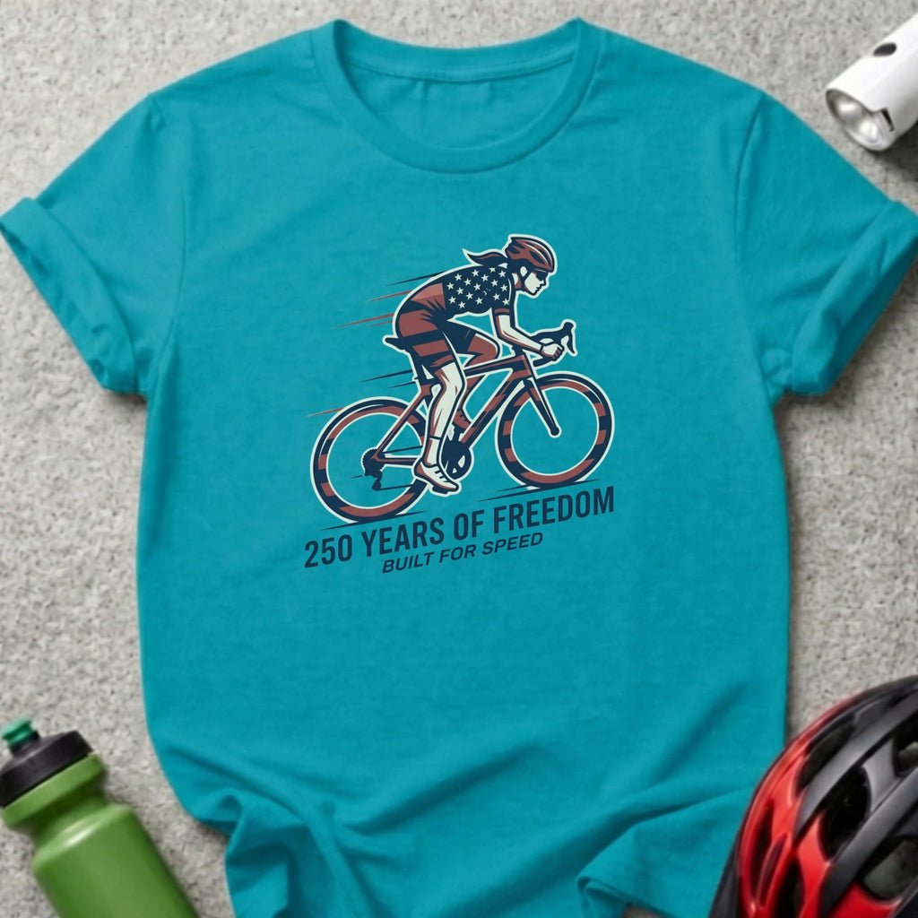 Teal t-shirt with cyclist graphic and text "250 YEARS OF FREEDOM BUILT FOR SPEED".