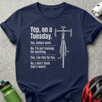 Navy t-shirt with a bicycle and humorous text about riding.