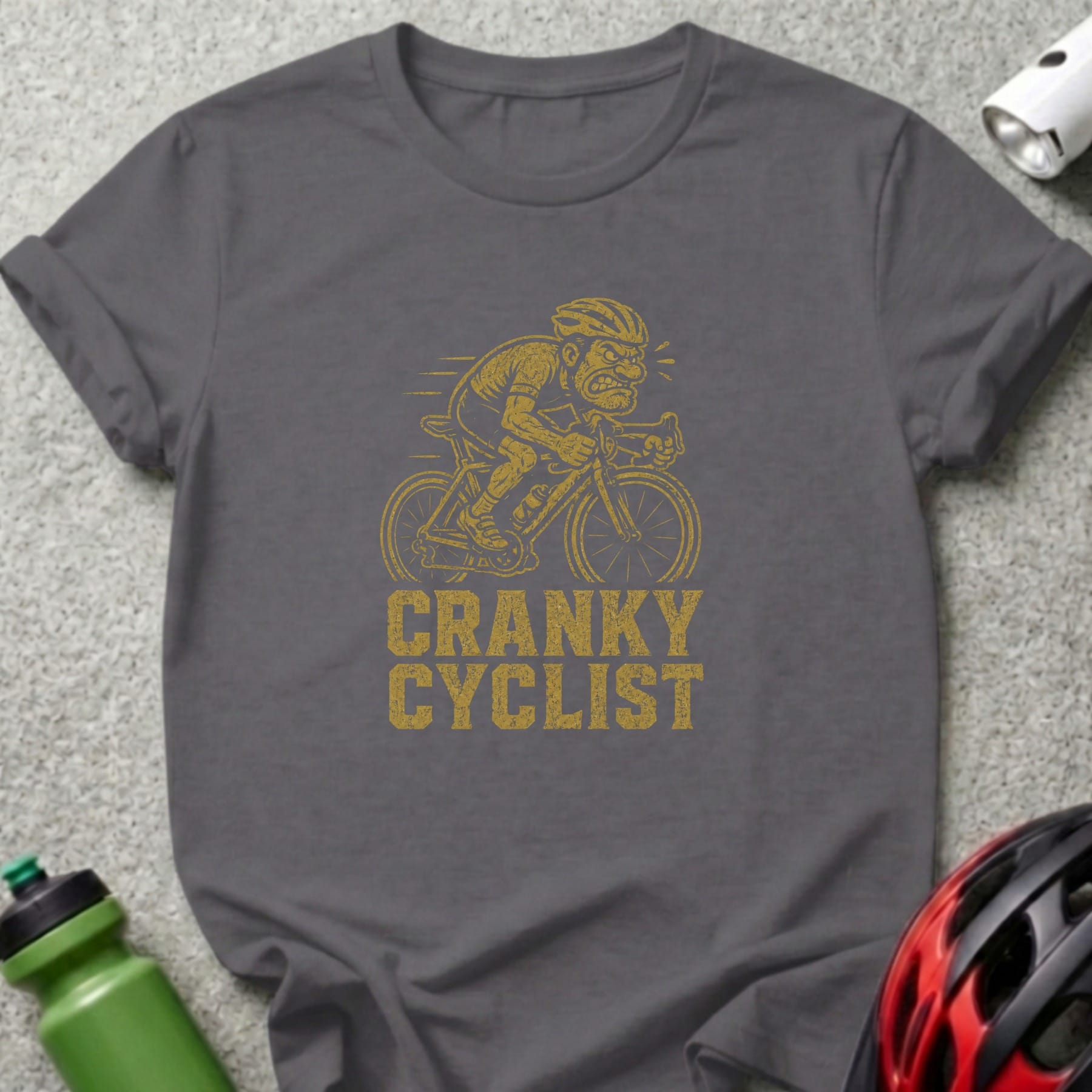 Dark grey t-shirt featuring a cartoon cyclist and the words "CRANKY CYCLIST".