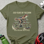 Shiba Inu on bicycle with American flag colors, "250 Years of Freedom", "Such Freedom. Much Speed."
