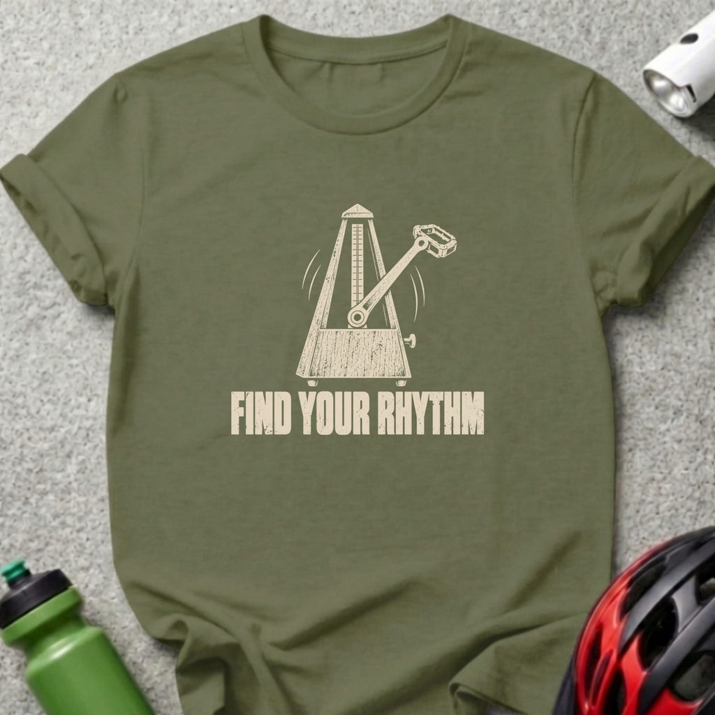Olive green t-shirt featuring a metronome design and the text Find Your Rhythm on a textured background.