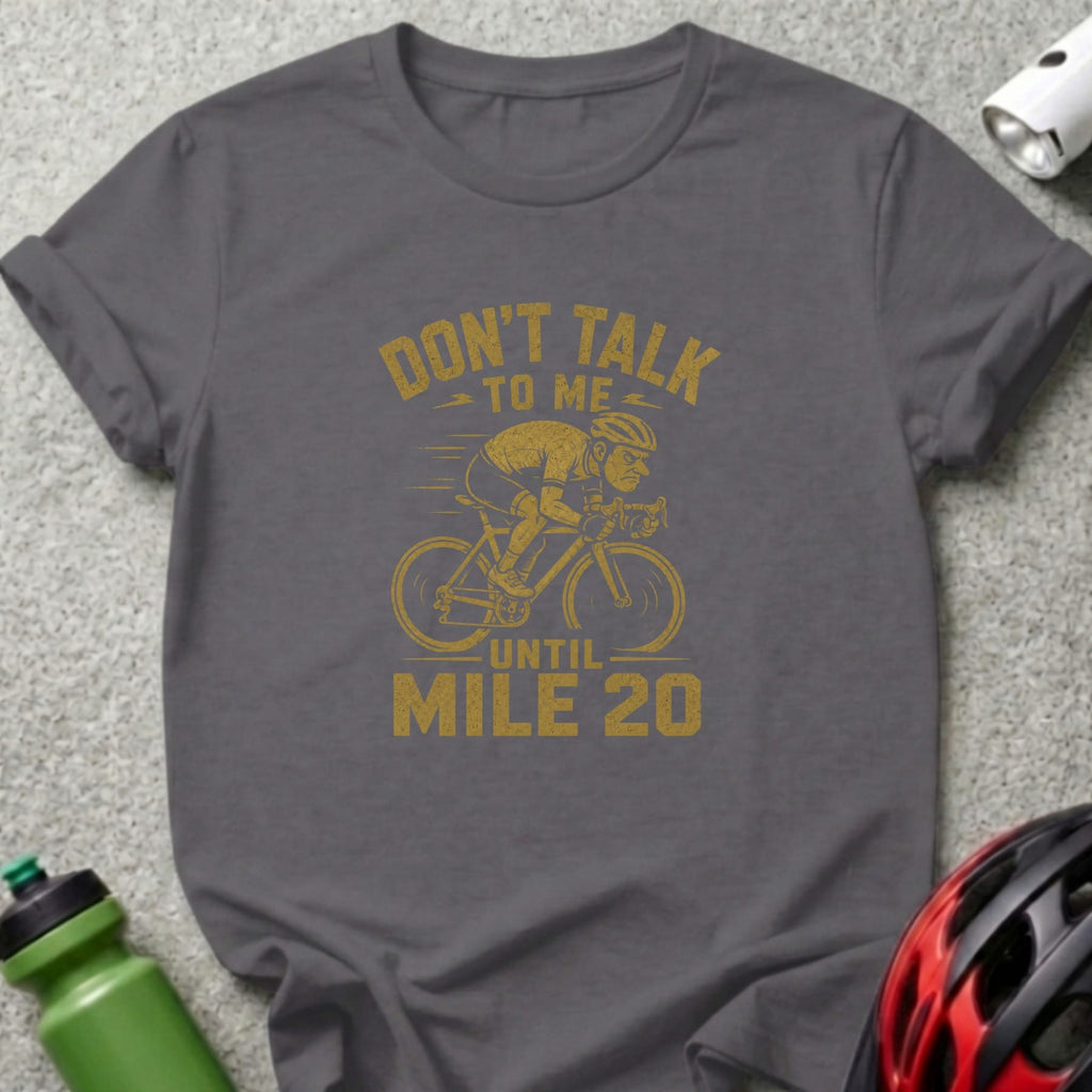 Cyclist graphic on a dark grey t-shirt reads "Don't Talk To Me Until Mile 20".
