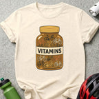 Bottle labeled "VITAMINS" filled with small colorful bicycles.