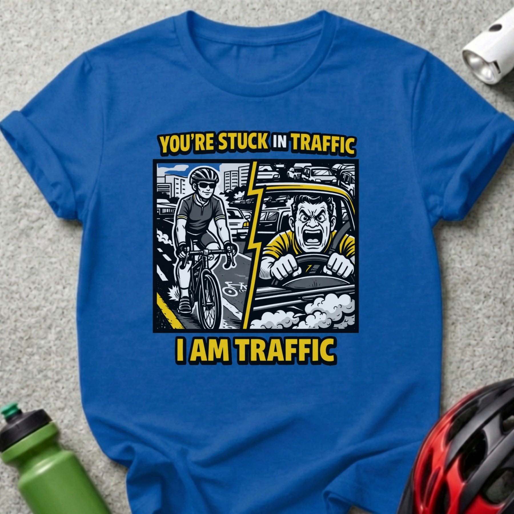 Blue t-shirt with a comic illustration of a cyclist and angry driver.