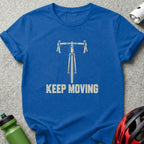 A royal blue t-shirt featuring a white graphic of bicycle handlebars and the text KEEP MOVING.