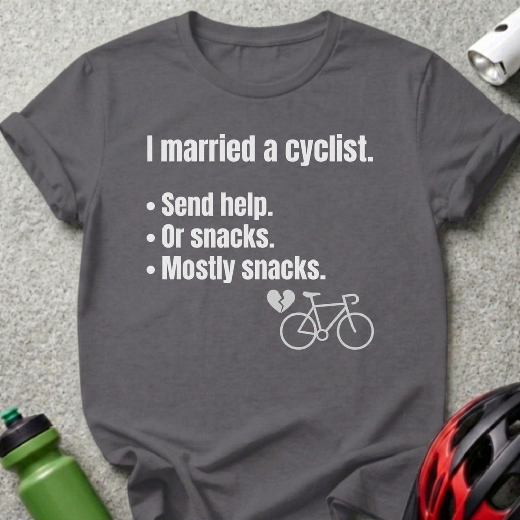 Gray t-shirt with text "I married a cyclist. Send help. Or snacks. Mostly snacks." and a bicycle icon.