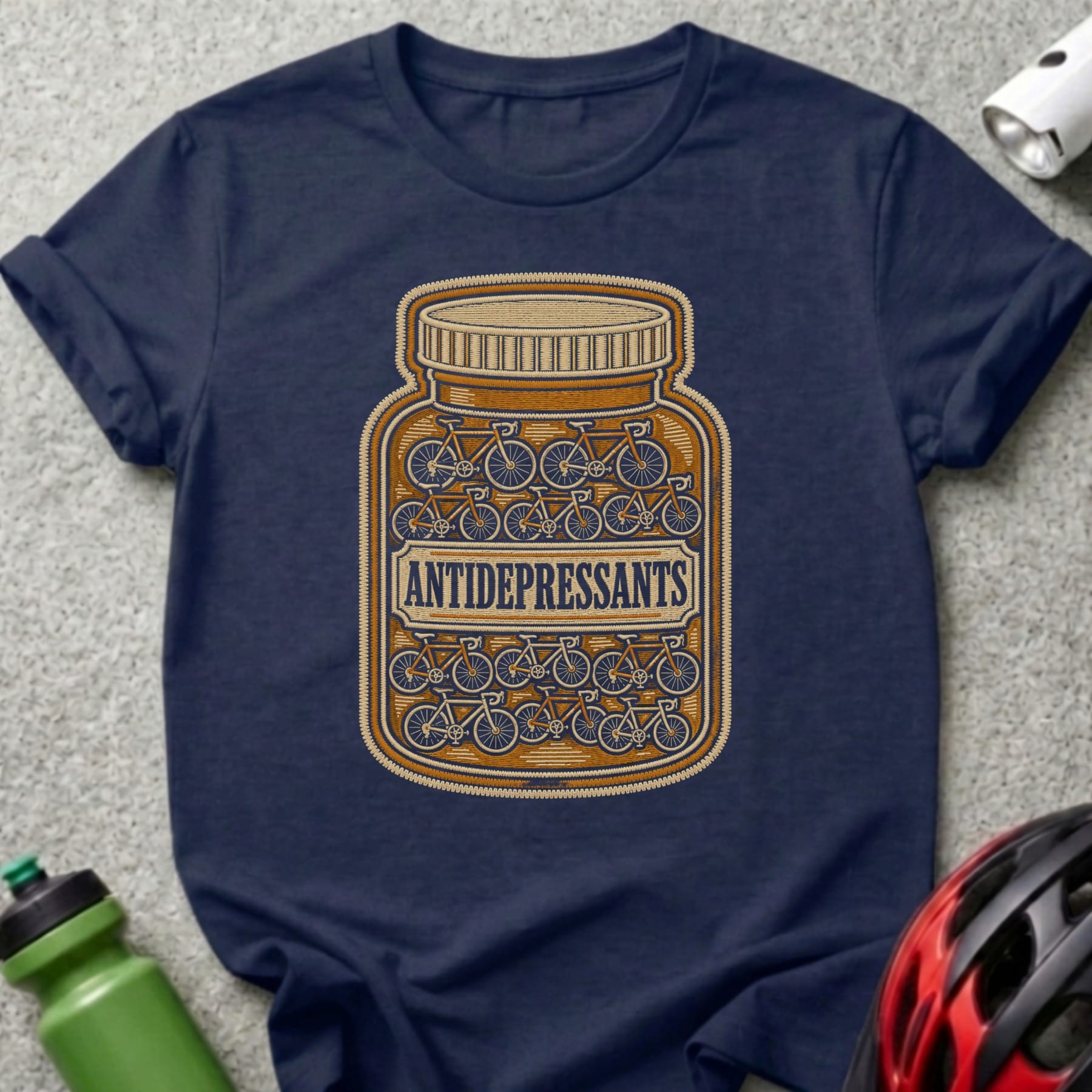 T-shirt graphic of a pill bottle filled with bicycles, labeled "ANTIDEPRESSANTS."