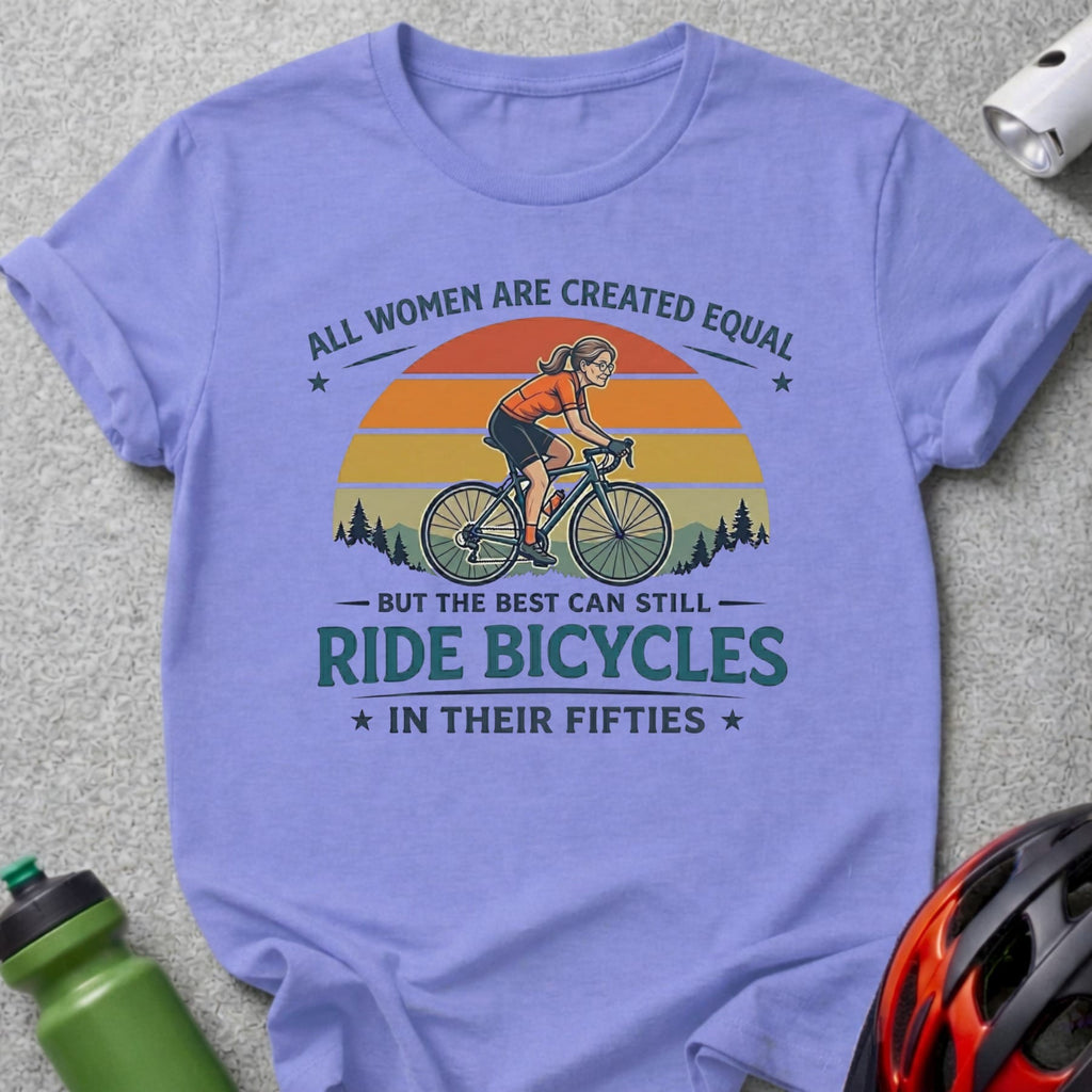 Purple t-shirt with text and illustration of a woman riding a bicycle.