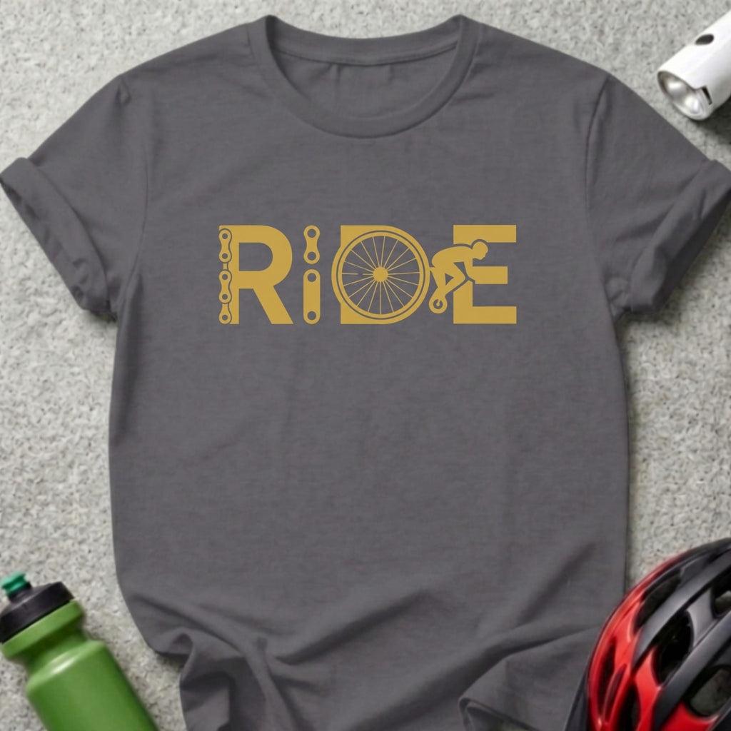 Dark gray t-shirt with "RIDE" in gold text, featuring a bike chain, wheel, and cyclist graphic.