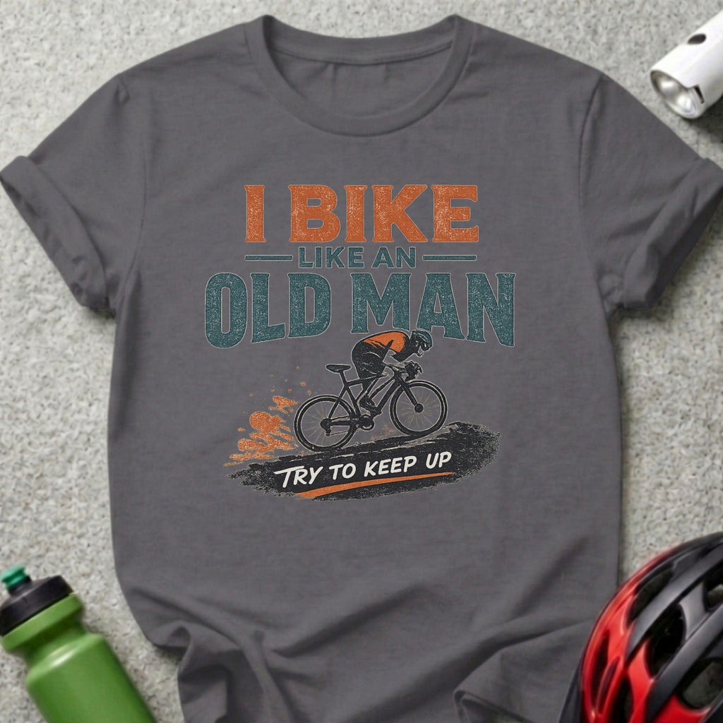 T-shirt with "I Bike Like An Old Man Try To Keep Up" slogan and cyclist graphic.