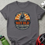 T-shirt with cyclist graphic and "Not Old, Just Clocking Miles" text.