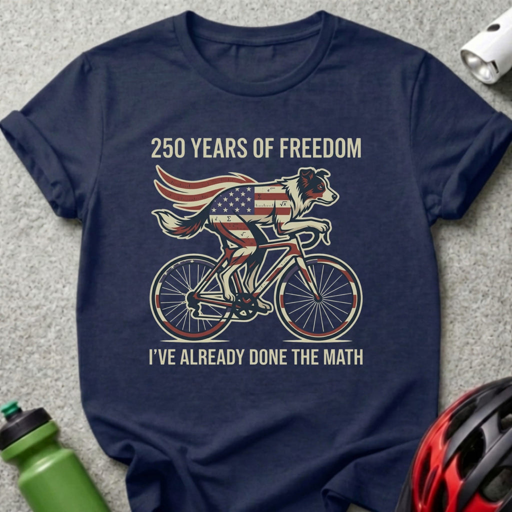 Dog on bicycle with American flag, "250 Years of Freedom" and "I've Already Done the Math".