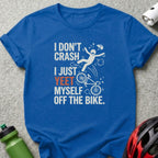 Blue t-shirt with "I DON'T CRASH I JUST YEET MYSELF OFF THE BIKE" text and illustration.