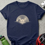 Navy blue t-shirt featuring a beige graphic of a cyclist riding in front of a vinyl record.