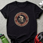 Black t-shirt with a circular graphic of a cyclist and the text "Miles Don't Count Years".