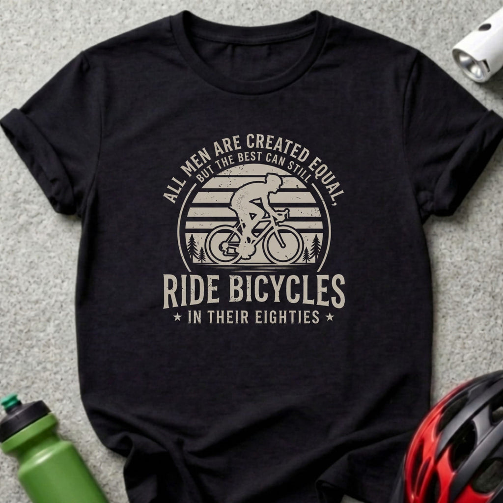 Black t-shirt with graphic depicting a cyclist, trees, and text.