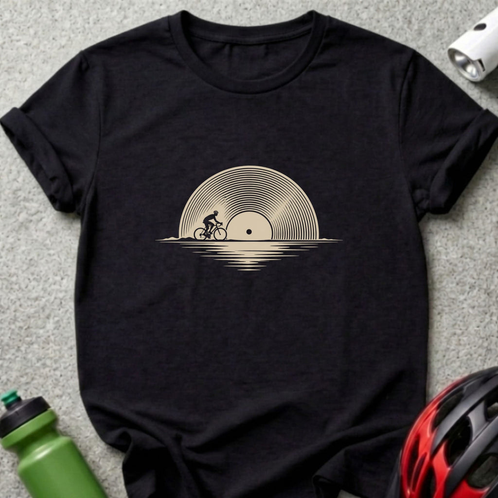 Black crewneck t-shirt featuring a beige graphic of a cyclist riding past a vinyl record.