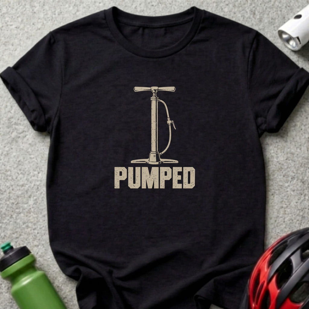 A black t-shirt features a vintage-style graphic of a bicycle floor pump above the word PUMPED.