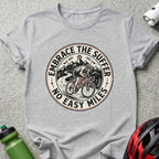 T-shirt with cyclist graphic and text "EMBRACE THE SUFFER NO EASY MILES".