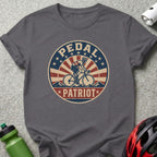 Gray t-shirt with "Pedal Patriot" text and cyclist graphic with retro design.