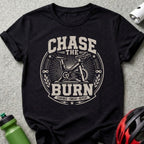 Black t-shirt with "Chase the Burn" cycling graphic and motivational text.