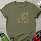 Olive green t-shirt with dotted gold cyclist graphic and motion lines.