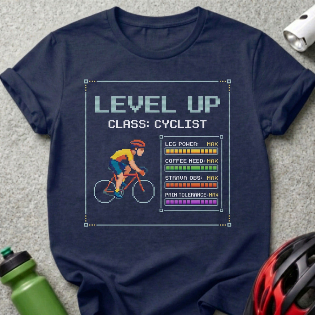 Navy t-shirt with pixel art cyclist and "Level Up Class: Cyclist" stats.