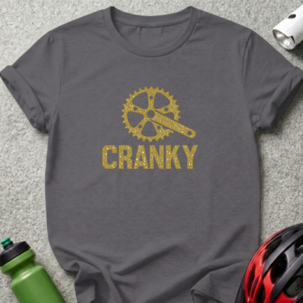 Dark grey t-shirt with gold glitter bicycle crank and "CRANKY" text.