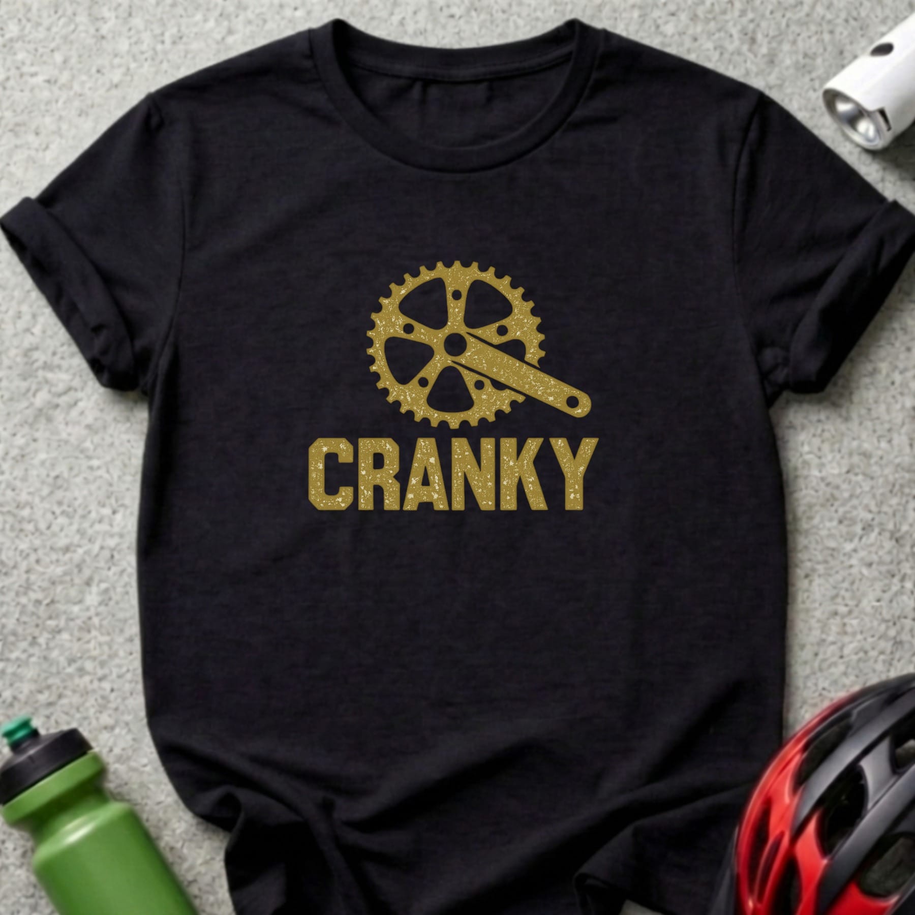 Black t-shirt with gold glitter bike crank and "CRANKY" text.