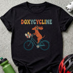 Doxycycline shirt with a dachshund riding a bicycle wearing headphones.