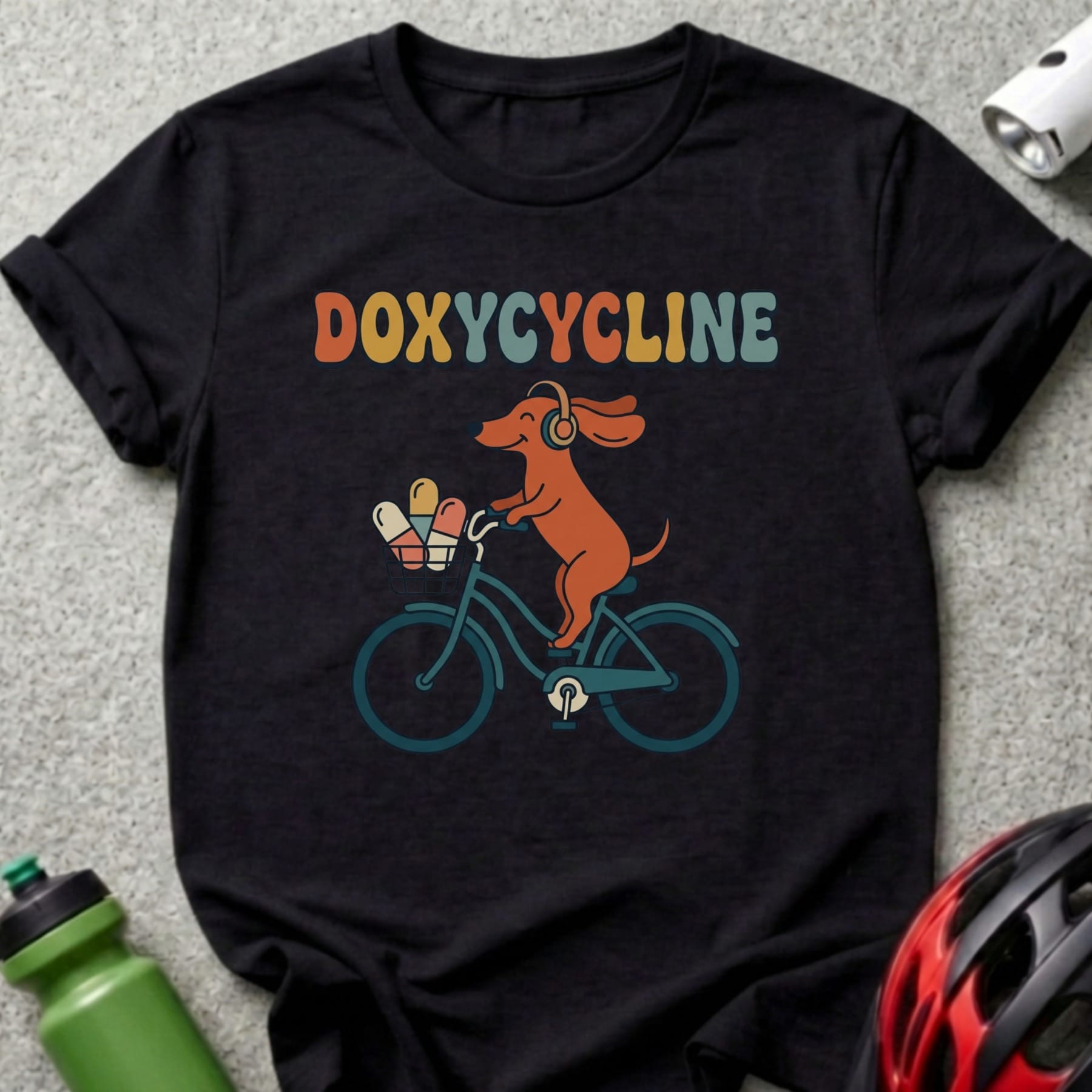 Doxycycline shirt with a dachshund riding a bicycle wearing headphones.