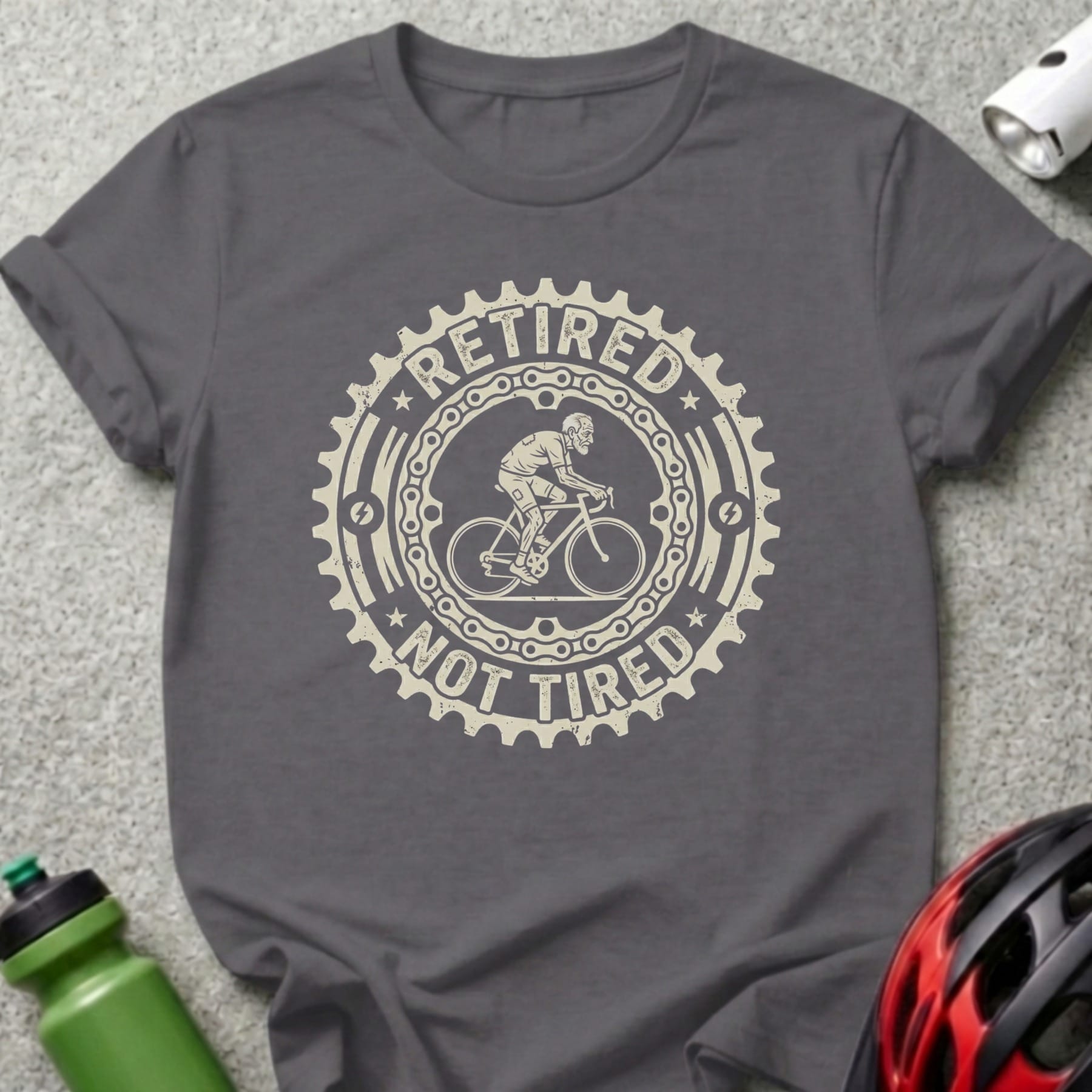 T-shirt with "Retired Not Tired" text and bicycle design.