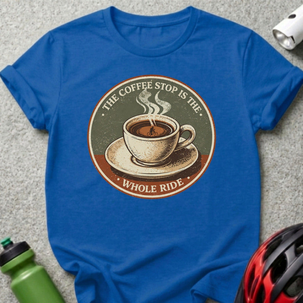 Blue t-shirt with circular graphic of coffee cup and bicycle wheel, text "The Coffee Stop is the Whole Ride".