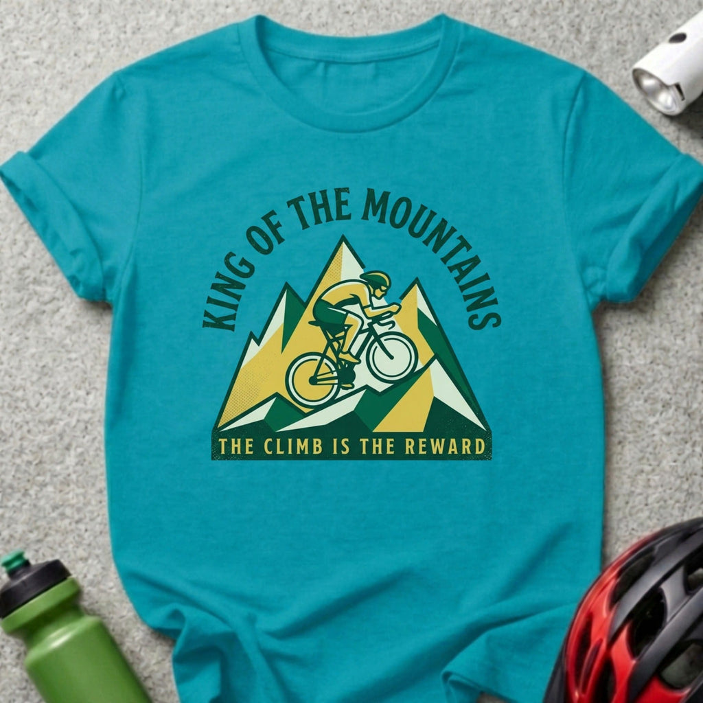 Turquoise t-shirt with mountain cyclist graphic and text "King of the Mountains".