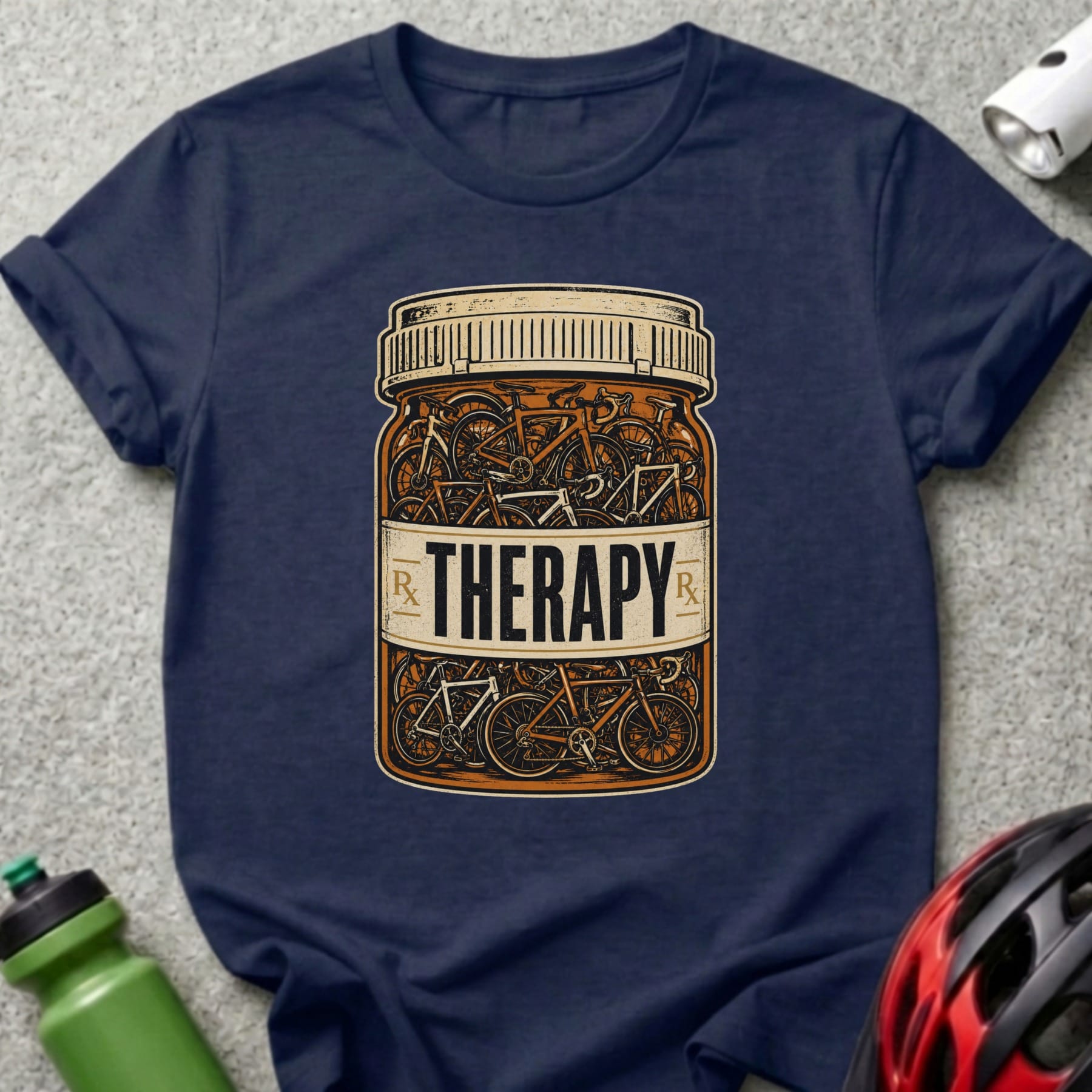 T-shirt featuring a pill bottle filled with bicycles labeled "Therapy".
