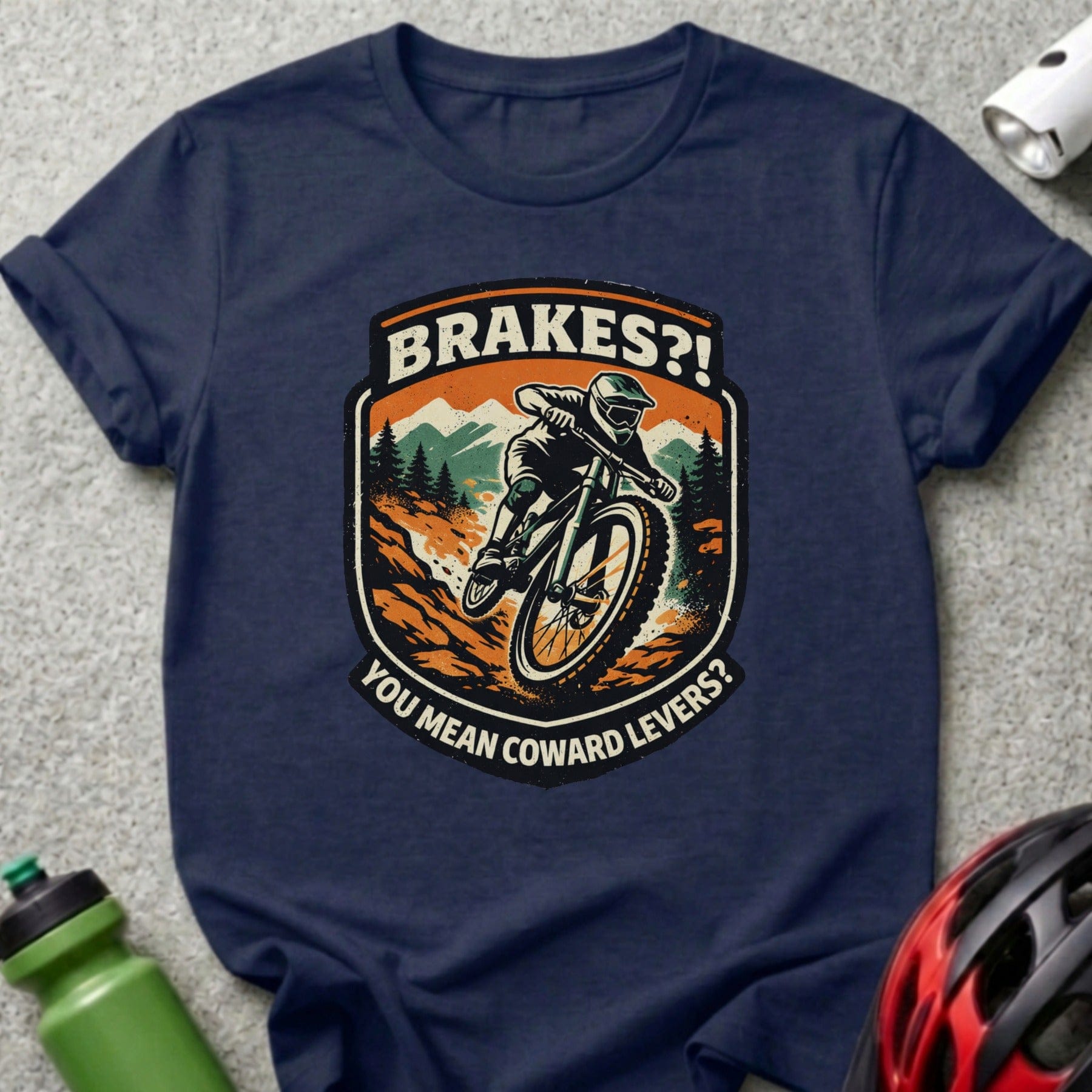 Navy t-shirt with "Brakes?! You mean coward levers?" graphic of a mountain biker.