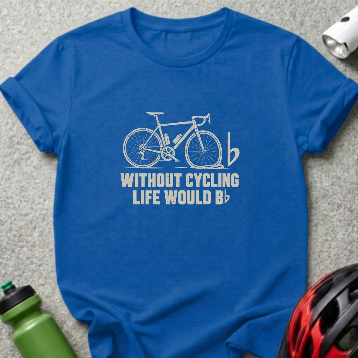 A blue t-shirt featuring a bicycle graphic and the text "WITHOUT CYCLING LIFE WOULD BE B FLAT".