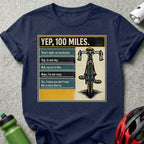 T-shirt with bicycle graphic and humorous text about riding 100 miles.