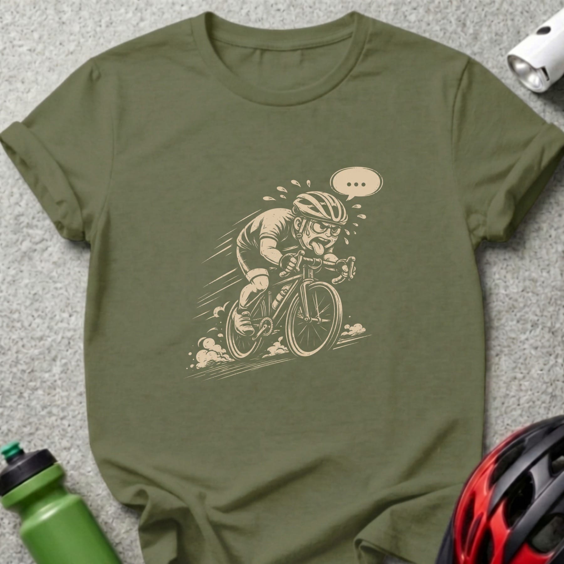 T-shirt featuring a cartoon cyclist pedaling hard with a speech bubble.