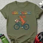 Dachshund on bicycle wearing headphones, carrying medicine capsules.