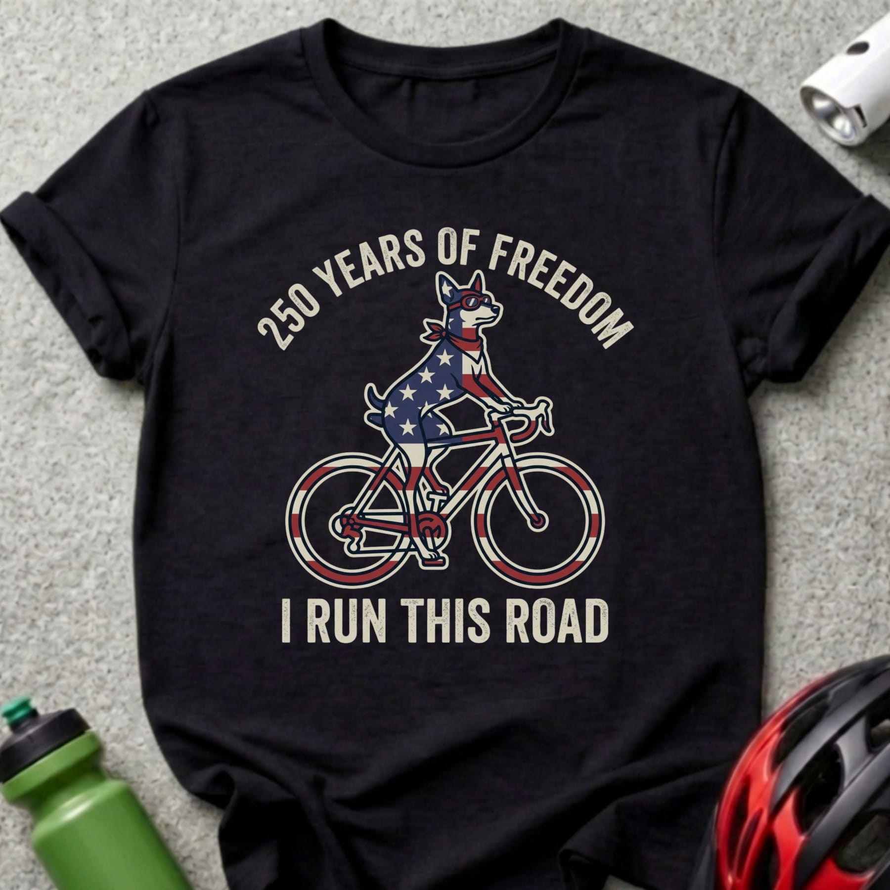 Black t-shirt with patriotic dog cycling graphic and text "250 Years of Freedom I Run This Road".
