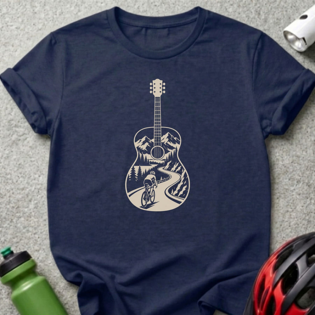 Navy blue t-shirt featuring a cream graphic of a guitar silhouette filled with a mountain landscape and cyclist.