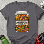T-shirt with a bottle labeled "ANTIDEPRESSANTS" filled with miniature bicycles.