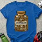 T-shirt with bottle graphic labeled "ANTIDEPRESSANTS" filled with coffee cups and bicycles.