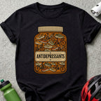 Black t-shirt with a graphic of a pill bottle filled with bicycles and running shoes.