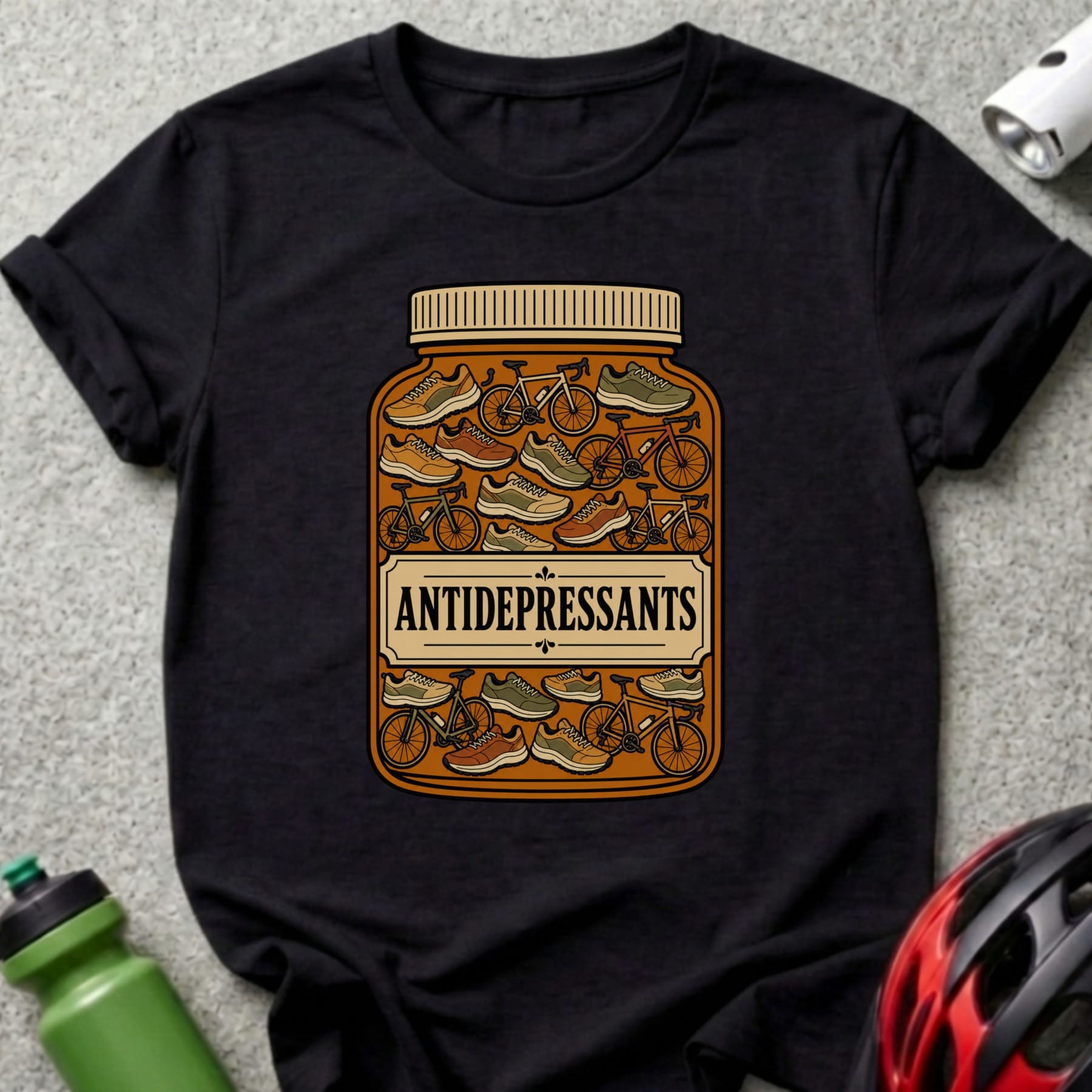 Black t-shirt with a graphic of a pill bottle filled with bicycles and running shoes.