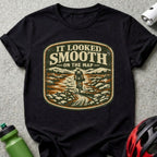 Black t-shirt with distressed graphic of a mountain biker and the text "IT LOOKED SMOOTH ON THE MAP".