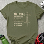 Olive green t-shirt with text "Yes, I cycle." and bicycle illustration.