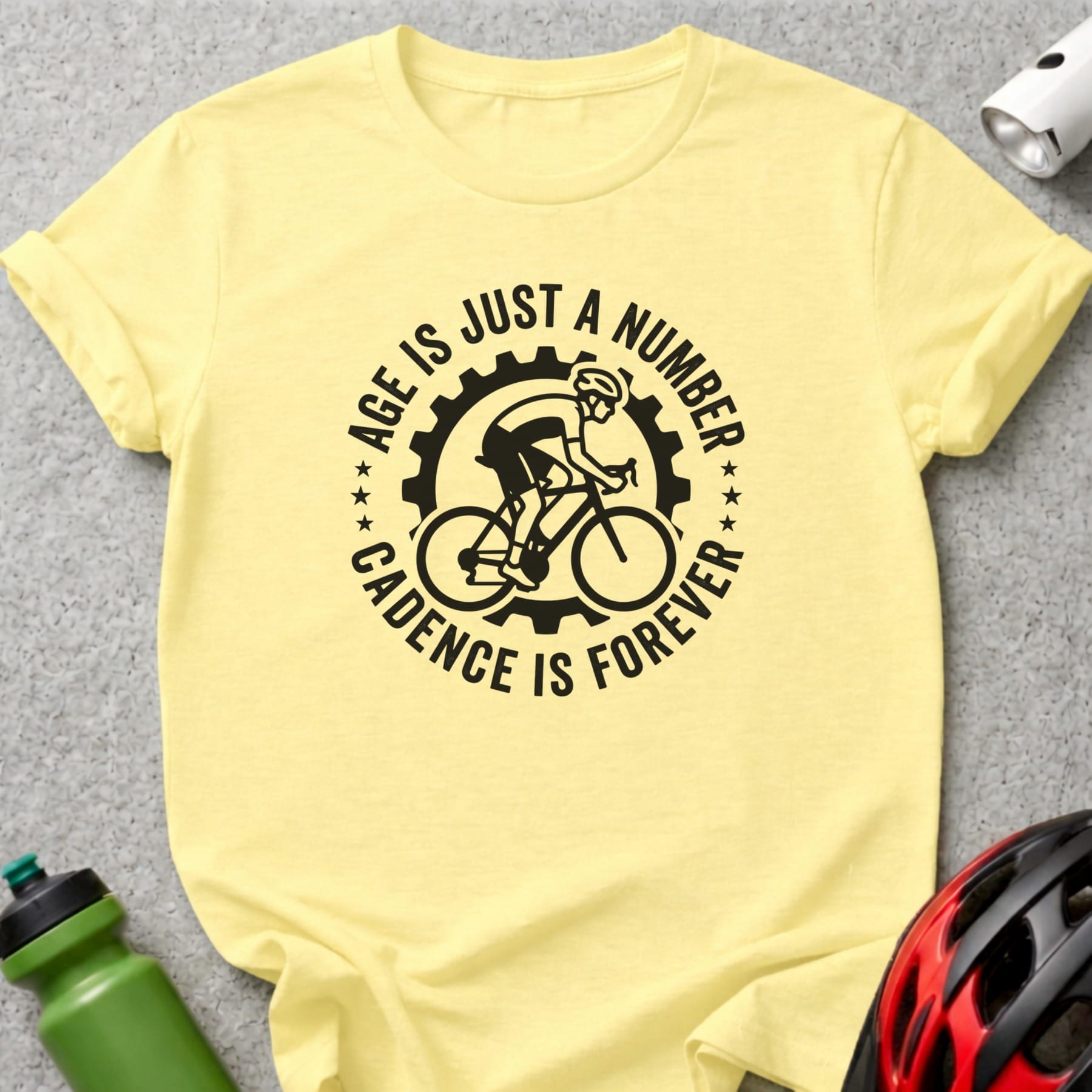 Yellow t-shirt with black graphic: "Age is just a number. Cadence is forever."